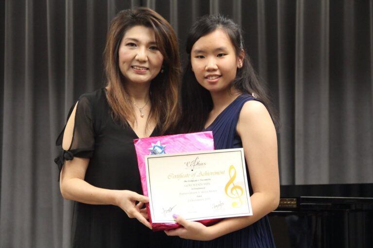 Cephas Music School, Annual Concert and Prize-Giving Day 2018, Dr. Andjelita Chendra with a student