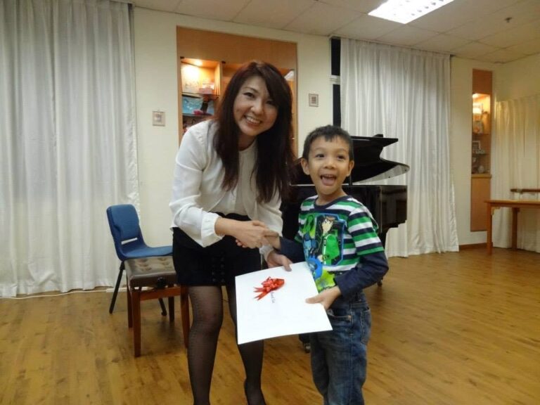 Cephas Music School, Annual Concert and Prize-Giving Day 2013, Dr. Andjelita Chendra with a student