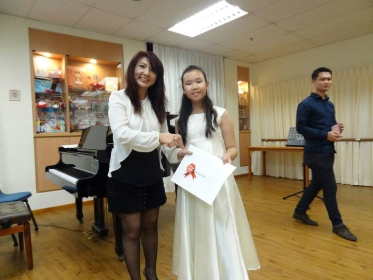 Cephas Music School, Annual Concert and Prize-Giving Day 2013, Dr. Andjelita Chendra with a student
