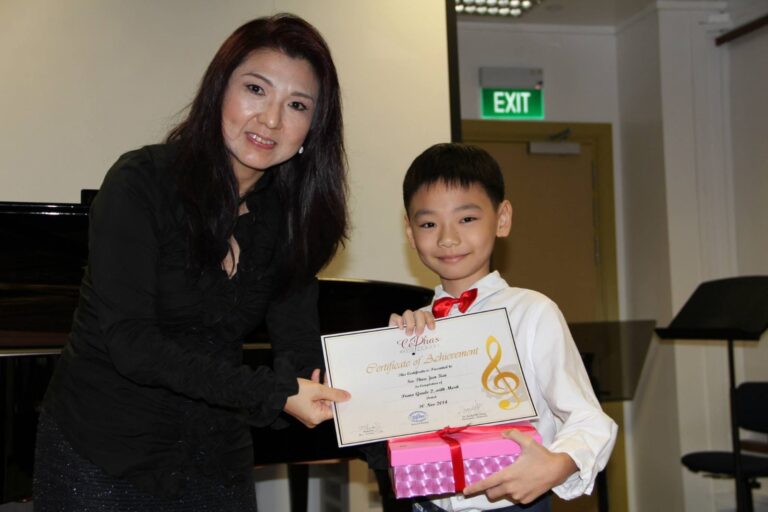 Cephas Music School, Annual Concert 2014, Dr. Andjelita Chendra with a student