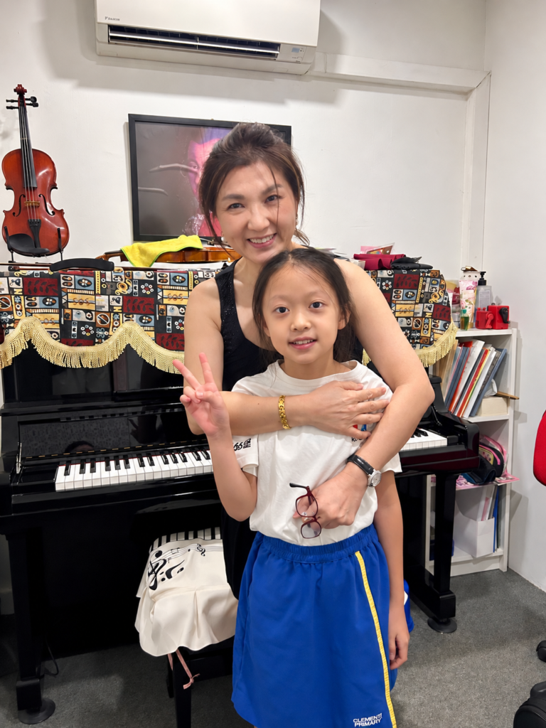 Alayna with Dr. Chendra in the Cephas violin studio